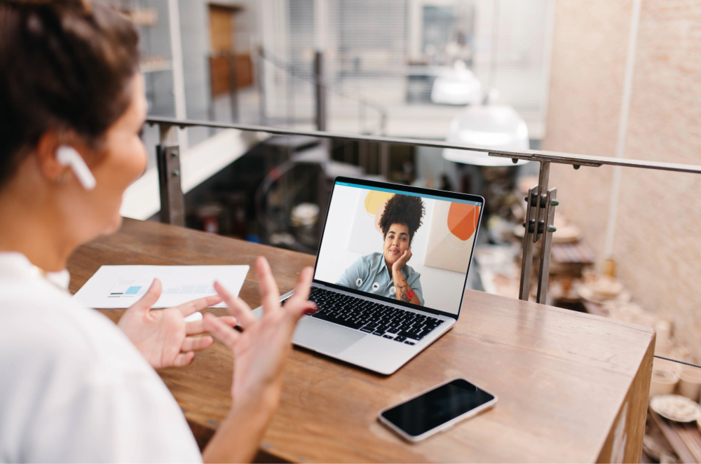 Person talking to colleague on video call