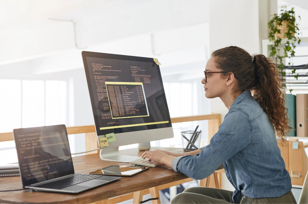 Female developer working at desk